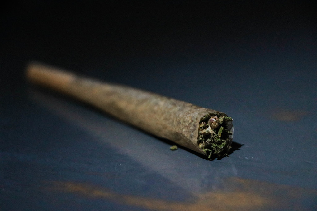 Pre-rolled cannabis joint on a table